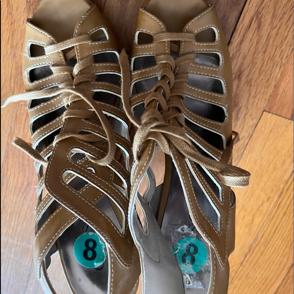 Pair of Guess sandals.  Too high for me but very cute.
